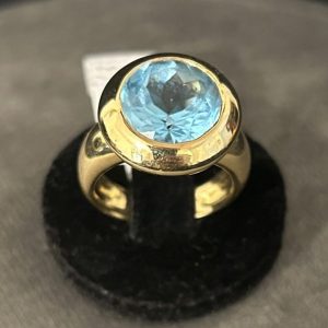 Bague topaze ronde en or jaune 18 carats (750/000)